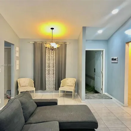Rent this 3 bed apartment on 1099 Southwest 8th Street in Pembroke Park, Hallandale Beach