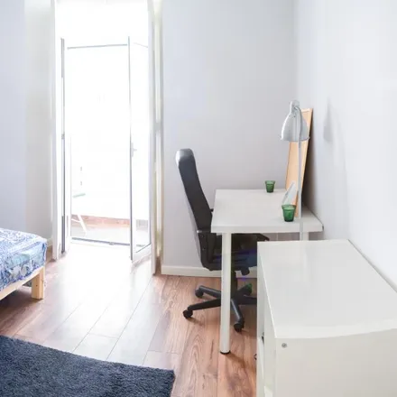 Rent this 7 bed room on Rua António Pedro 52 in 1000-040 Lisbon, Portugal