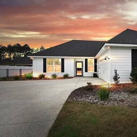 Rent this 3 bed house on 255 Isabella Way in Jesup, GA 31546