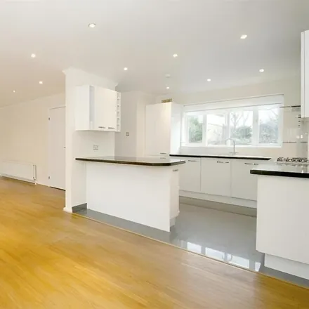 Rent this 4 bed townhouse on 10 Oak Park Gardens in London, SW19 6AR