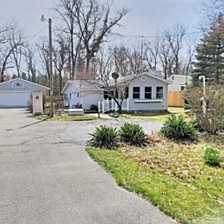 Buy this 2 bed house on 28 Center Line Road in Pleasant Plains Township, MI 49309