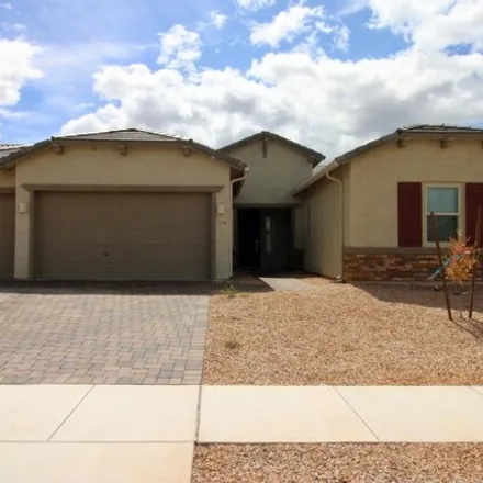 Rent this 4 bed house on East Prairie Aster Lane in Pima County, AZ 85731