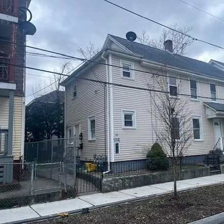 Buy this 6 bed townhouse on 108 Sylvian Street in Central Falls, RI 02863