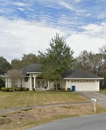 Buy this 3 bed house on 12399 Willow Tree Court in Spring Hill, FL 34609