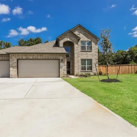 Rent this 4 bed house on Heritage Way in Conroe, TX 77387