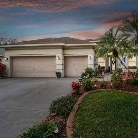 Buy this 4 bed house on 3503 Williston Loop in Land O' Lakes, FL 34639