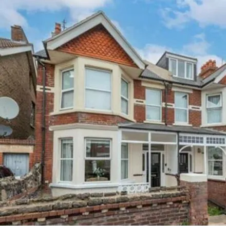 Rent this 4 bed house on Dixons News in 60 Whitley Road, Eastbourne