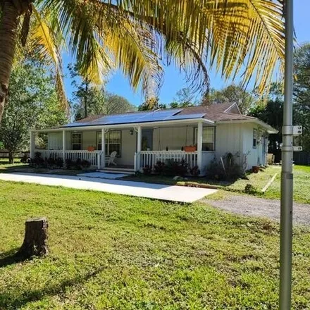 Buy this 5 bed house on 15152 Scott Place in Loxahatchee Groves, FL 33470