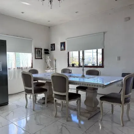 Buy this 6 bed house on Eva Perón in Partido de Ensenada, Ensenada