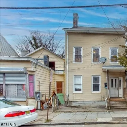 Buy this 8 bed house on 92 Arch Street in Paterson, NJ 07522