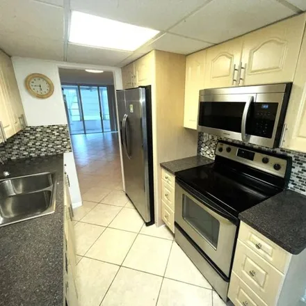 Rent this 2 bed condo on Northwest 30th Street in Lauderdale Lakes, FL 33313