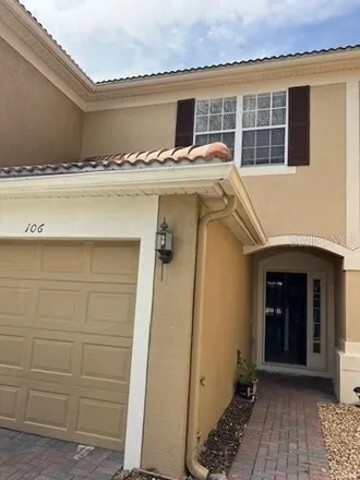 Rent this 2 bed townhouse on 3508 Shallot Drive in MetroWest, Orlando