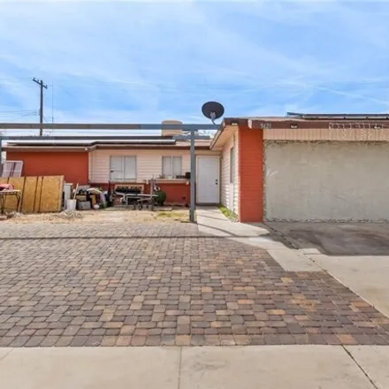 Buy this 5 bed house on 5689 West Bartlett Avenue in Las Vegas, NV 89108