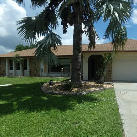 Buy this 3 bed house on 675 Riviera Lane Northwest in Port Charlotte, FL 33948