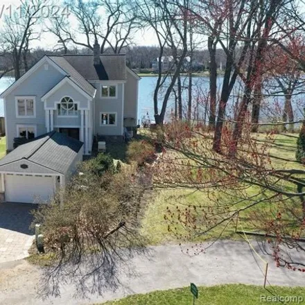 Buy this 4 bed house on Lake View Court in Commerce Charter Township, MI 48382