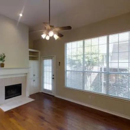 Rent this 3 bed apartment on 3137 Kings Canyon Drive in Courtyard at Russell Creek, Plano
