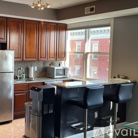 Rent this 1 bed condo on 2416 West Street