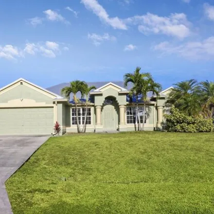 Rent this 4 bed house on 4655 Southwest Galaxie Street in Port Saint Lucie, FL 34953