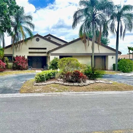 Buy this 4 bed house on 6479 Northwest 56th Street in Coral Springs, FL 33067