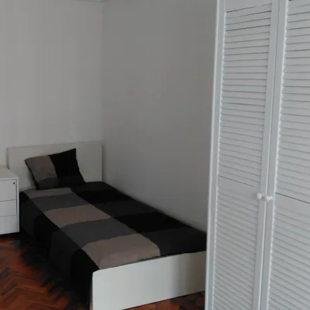 Rent this 5 bed room on Rua da Ilha Terceira 41 in 1000-172 Lisbon, Portugal