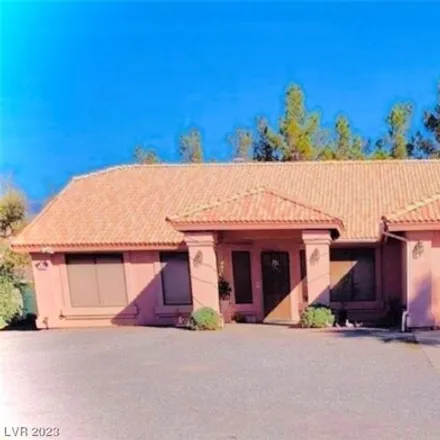 Buy this 7 bed house on 3057 Rainbow Avenue in Pahrump, NV 89048