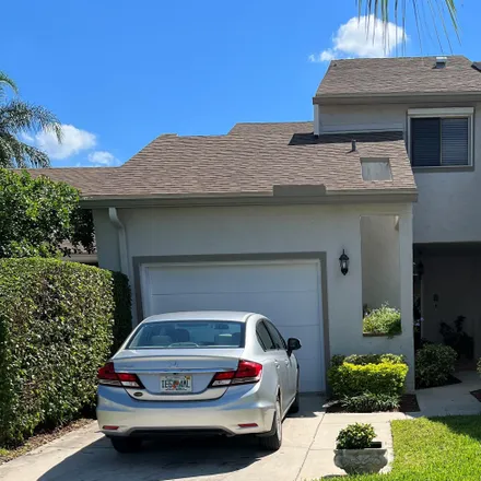 Buy this 3 bed townhouse on 6681 Canary Palm Circle in Boca Del Mar, Palm Beach County