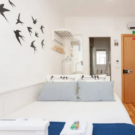 Rent this 2 bed room on Rua de Bartolomeu Costa 26 in 1170-041 Lisbon, Portugal