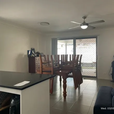 Rent this 4 bed apartment on Coomera Rivers State School in Lisa Crescent, Coomera QLD 4209