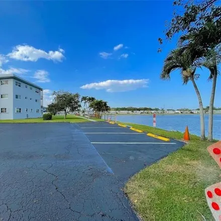 Rent this 2 bed condo on Park Lane in Hollywood, FL 33021