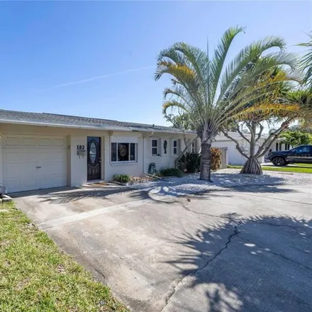 Buy this 4 bed house on 183 94th Ave Ne in Saint Petersburg, Florida