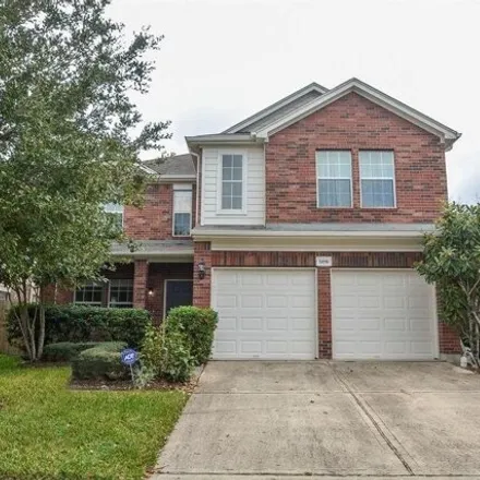 Rent this 4 bed house on 5819 Trinity Oaks in Missouri City, Texas