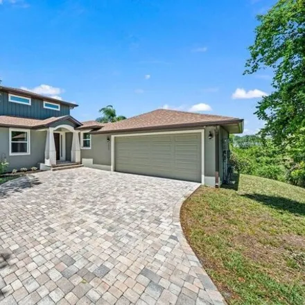 Buy this 4 bed house on 1098 Tortoise Cove in Melbourne, FL 32935