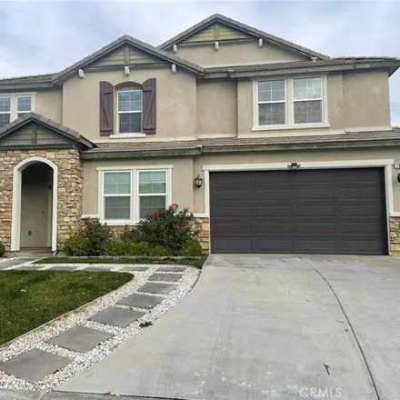 Rent this 4 bed house on 7682 Rotunda Court in Riverside County, CA 92313