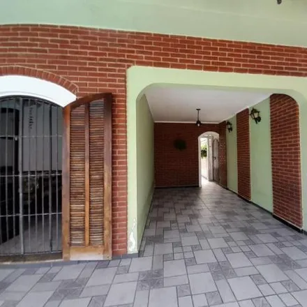 Buy this 3 bed house on Rua Marco Aurélio Donzelini in Flórida, Praia Grande - SP