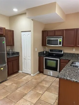 Buy this 3 bed townhouse on 21201 Northwest 14th Place in Miami Gardens, FL 33169