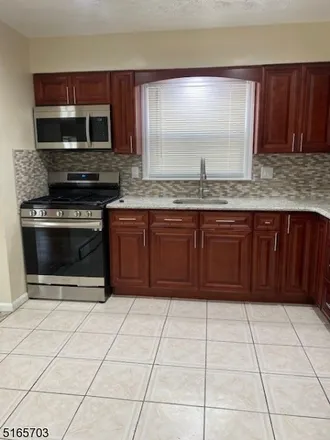Rent this 3 bed townhouse on 1068 Sanford Avenue in Irvington, NJ 07111