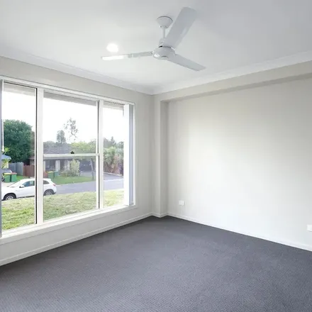 Rent this 3 bed apartment on Penrose Circuit in Redbank Plains QLD 4301, Australia