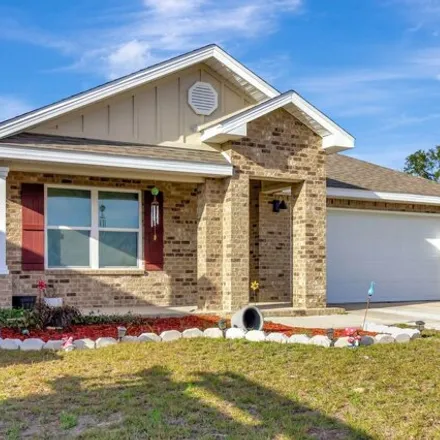 Rent this 4 bed house on Honor Guard Wy in Okaloosa County, FL 32593