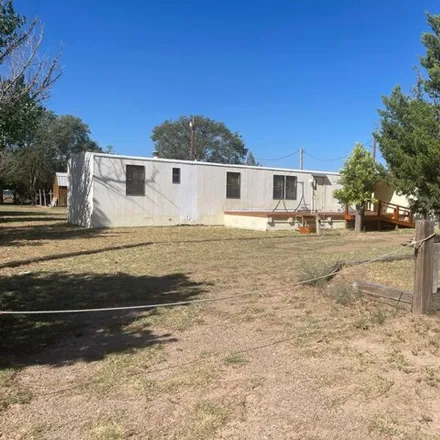 Buy this studio apartment on 692 Impala Drive in Quay County, NM 88426