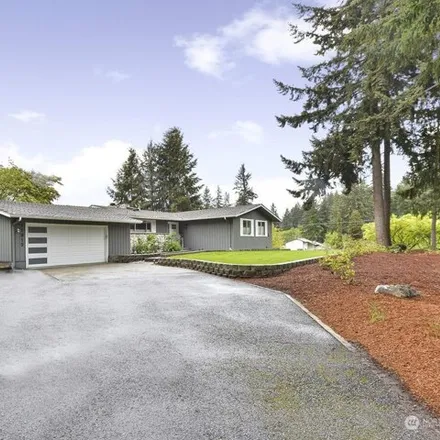 Buy this 4 bed house on 11911 136th Avenue East in South Hill, WA 98374