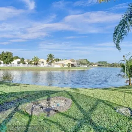 Buy this 3 bed house on 4229 Banyan Trails in Coconut Creek, FL 33073