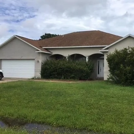 Rent this 3 bed house on 14 Lyndenhurst Ln in Palm Coast, Florida