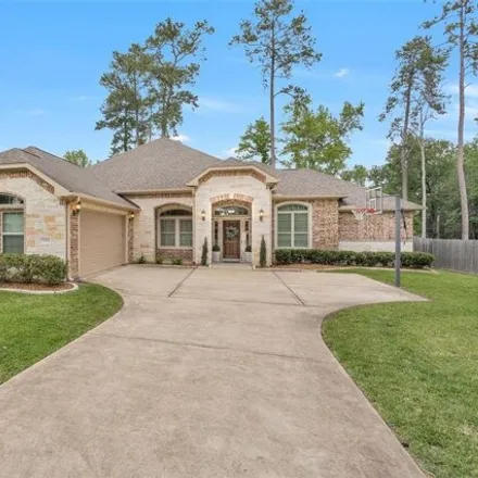 Buy this 4 bed house on 7048 Ramblewood Drive in Montgomery County, TX 77354