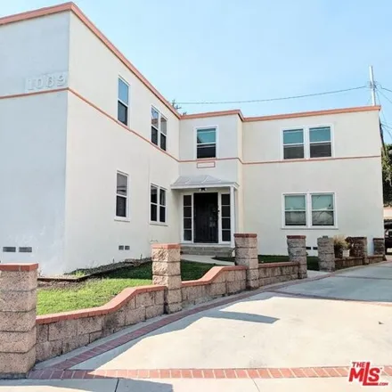 Buy this 6 bed house on 1076 South Orange Drive in Los Angeles, CA 90019