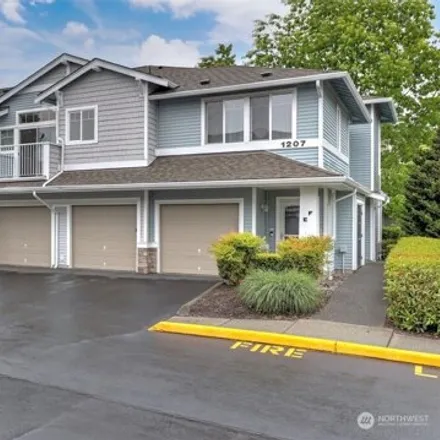 Buy this 2 bed condo on 1207 63rd Street Southeast in Auburn, WA 98092