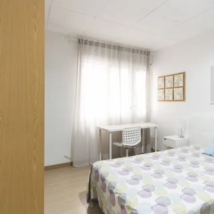 Rent this 8 bed room on Madrid in Centro Deportivo Municipal Gimnasio Moscardó, Calle de Coslada