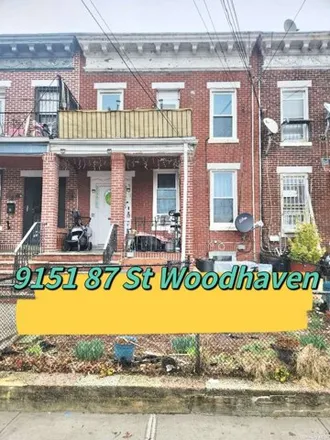 Buy this 5 bed house on 91-51 87th Street in New York, NY 11421