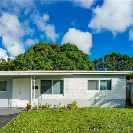 Rent this 3 bed house on 177 Northeast 43rd Court in North Andrew Gardens, Oakland Park