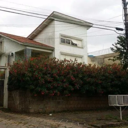 Buy this 3 bed house on Rua Felipe Becker in Três Figueiras, Porto Alegre - RS