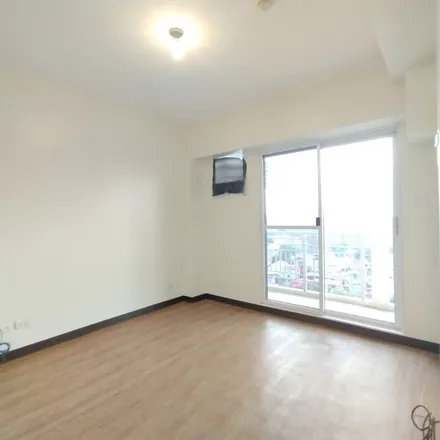 Rent this 2 bed apartment on South Zinnia Tower in Zinnia Road, Katipunan